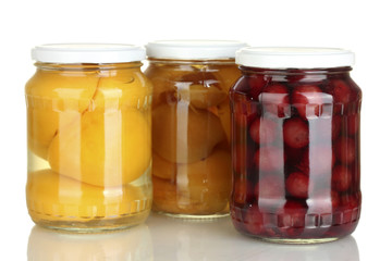 Fototapeta na wymiar Jars of canned fruits isolated on white