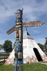 Wall murals Indians A colorful totem pole in Western City, Sciegny, Poland