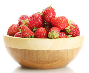 sweet ripe strawberries in wooden bowl isolated on white