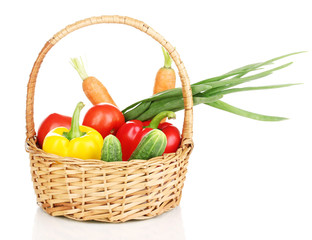 Fresh vegetables in basket isolated on white