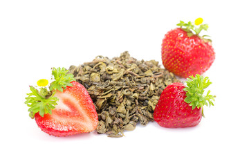 green fruit tea with strawberries on white