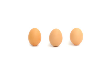 three eggs on white background