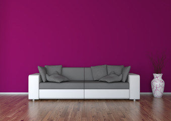 Sofa vor weinroter Wand mit Vase