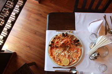 Pizza with Pasta food combination, Restaurant table from above