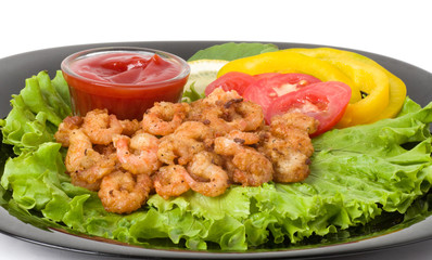 Tasty fried prawn food with vegetables and sauce
