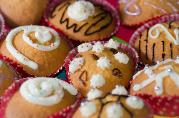 Different cupcakes decorated in various ways