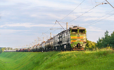 Freight train hauled by diesel locomotive. Belarusian railway