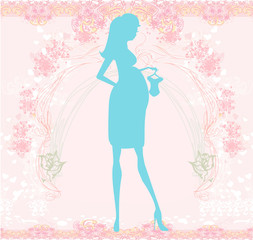 Beautiful pregnant woman on shopping for her new baby- abstract