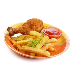 Fried drumsticks with french fries