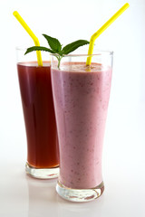 strawberry cocktail and juice with mint leaves and straw