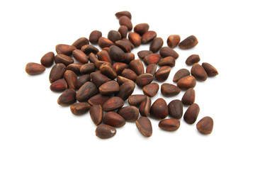 pine nuts on a white background