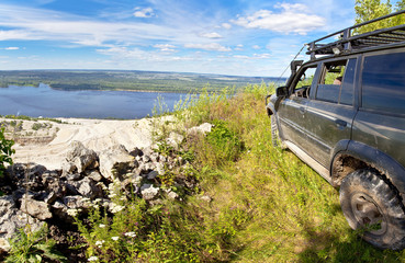 All-wheel drive SUV on the edge of a cliff