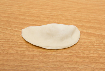 homemade meat dumplings on a cutting board