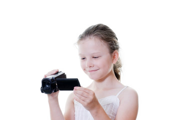 preteen girl with video camera