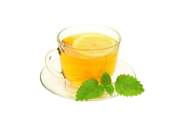 Cap of tea with lemon and lemon balm isolated on  white