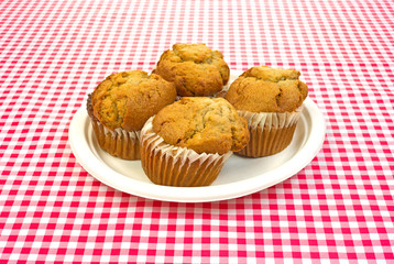 Apple spice muffins on plate