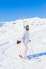 Fototapeta na wymiar Young girl a ski wear