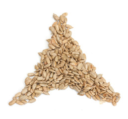 fresh sunflower seeds isolated on a white background