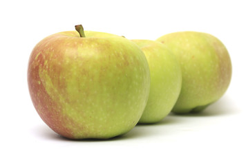 row of three apples