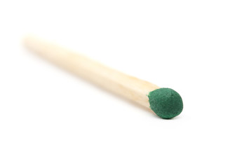 match with a green head isolated on white