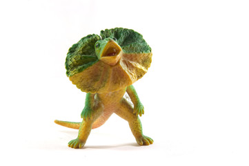 Toy plastic Chameleon front of white background