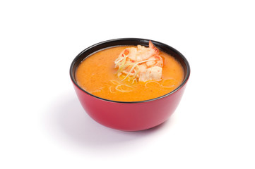Soup. Thai soup. On a white background. Tiger shrimp, chicken, s