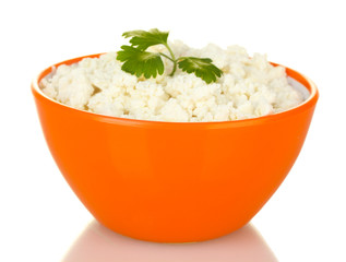 cottage cheese with parsley in orange bowl isolated on white
