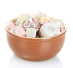 Bowl with delicious turkish delight isolated on white close-up