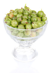 Green gooseberry in glass isolated on white