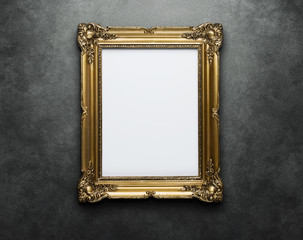 Ornate gold frame at the concrete wall with clipping path