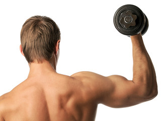 Fototapeta na wymiar Muscular young man lifting a dumbbell, rear view