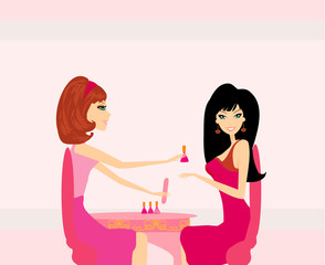 Young lady doing manicure in beauty salon