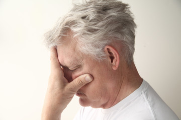 Fototapeta premium side view of man who is embarrassed or disappointed