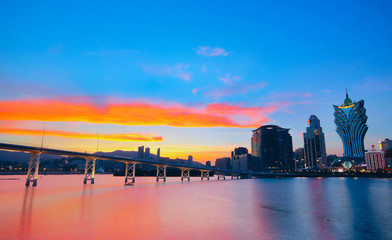 Macao cityscape with famous landmark of casino skyscraper and br