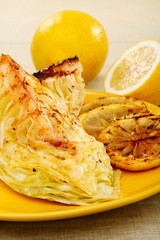 Young cabbage with a lemon sauce.