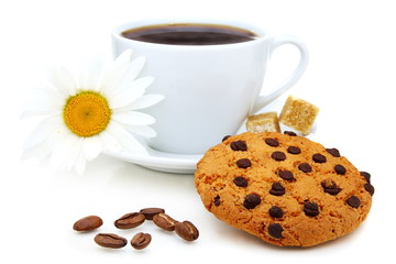 Shortbread cookies, coffee beans and a cup of coffee.