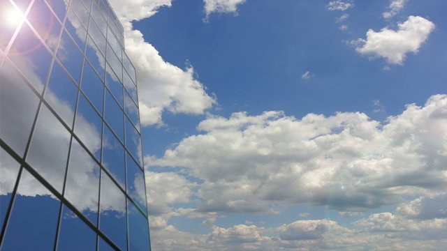 Office building cloud reflection. Time lapse