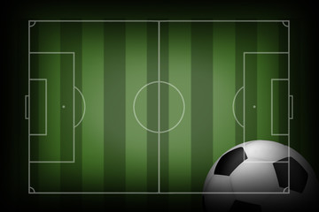 Naklejka premium soccer football on grass field