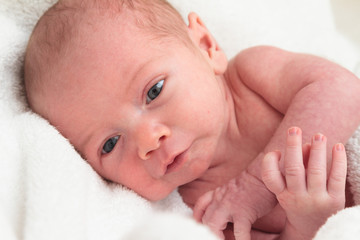 Infant on towel after bath