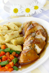 Chicken breast with potato dumplings and vegetables