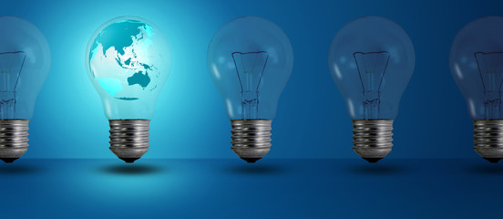 map glow among other light bulb on a blue background
