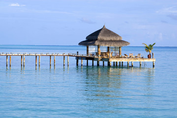Pathway to a watercafe facing the ocean in Maldives