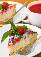 A piece of strawberry cheesecake