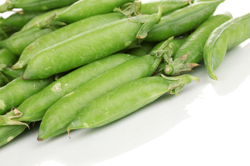 Green peas isolated on white