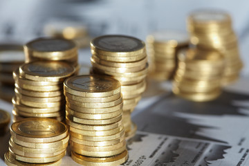 Business diagram on financial report with coins