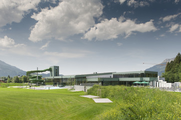 Obraz premium swim bath with outdoor pool and water slide at summer day