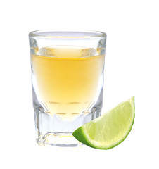 Glass of vodka with pepper and lime slice isolated on white