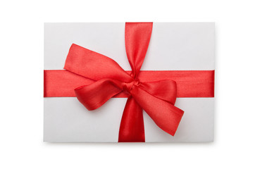 Envelope with colourful ribbon on white