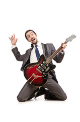 Young guitar player isolated on white
