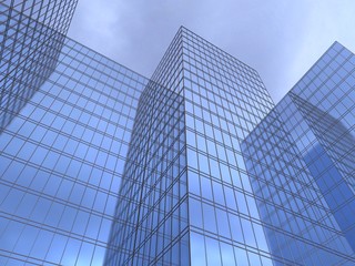 Fototapeta na wymiar a facade of office to sue reflecting a blue sky